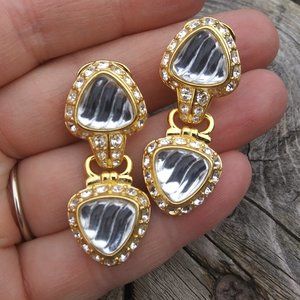 Vintage NOLAN MILLER gold tone metal with wavy clear glass drop clip earrings